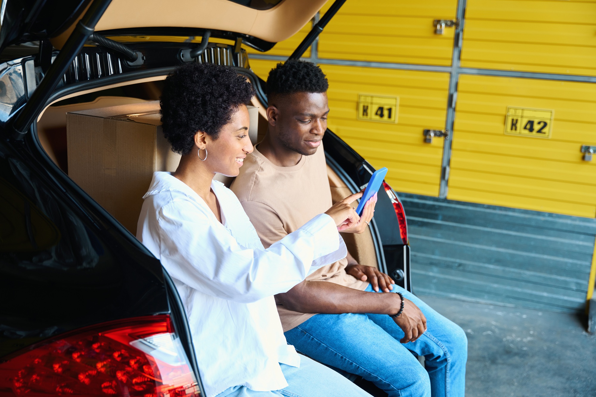 African American couple in the storage service